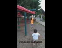 Orange shirt kid falls off playground brother