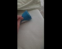 Person opens ice cream with two wrappers