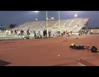 Pole vaulter runs towards bar and bounces backwards off pole