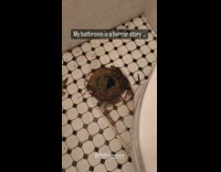 Hole in floor of guys restroom and someone on other side of hole