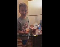 Little boy drinks unsweetened tea doesnt like it 