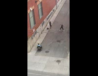 Woman black jumper dance alley wheelchair guy