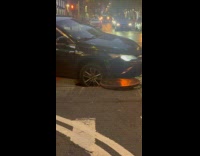 Car stuck on manhole early morning disaster
