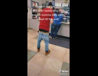 Guy with sagging pants has mom close car door