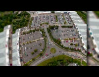 Top view time lapse parking lot cars roundabout