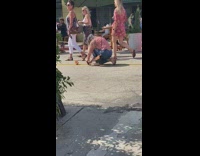 Girl copper cocktail mug middle of street