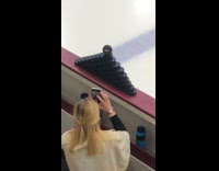 Hockey puck pyramid ice rink white jacket 