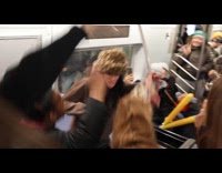 Passengers jamming to DJ playing Cardi B