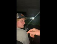 Guy turned around driving drives into darkness