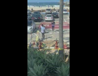 Twin influencers knock over sign at beach lot