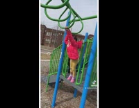 Daughter gets stuck on monkey bars and dad laughs
