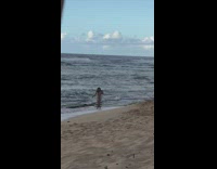 Girl sheer dress beach shore selfie 