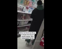 Girl in target aisle singing for neyo