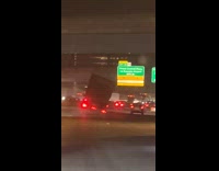 Truck with cargo swerves on the highway