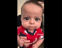 Collab ClipsIG - Woman shows baby with big round eyes