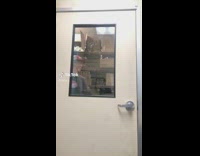 Coworkers behind door window fighting wendys