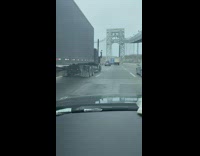 Grey truck with spikes and metal chains 