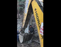 Man Tries to Run From Caterpillar Plow Gets Stuck in Ground