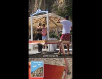 Woman holing white pool with 5 on it