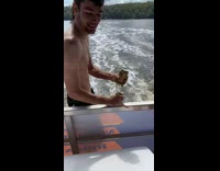 Man Throws Beer in Tin Can to Friend