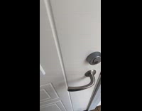 Man struggle to put keys into hole