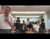 Classroom full of girls hit the woah dance with their teacher