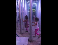 Little girl walks into mirror maze fail 