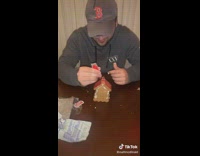 Guy smashes friends gingerbread house 