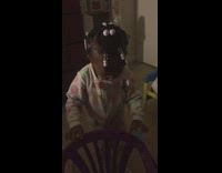 Little girl wears panty liner pad stickers on her face