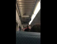 two guys in luggage compartment on train