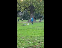 Person with a pink headphones balances arm crutch