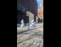 Nuns playing basketball at outdoor court