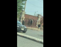 Woman face mask slow dance video shoot empty parking lot