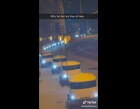 White food delivery robots stuck in traffic 