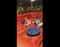 Little girl pink bow trampoline park 