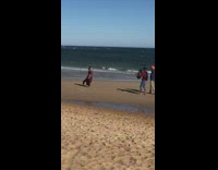 Girl maroon dress walk windy beach bollywood