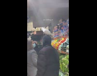 Guy enters market with bird on pt. 2
