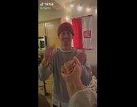 Guy makes 2 red balls appear in hand magic trick