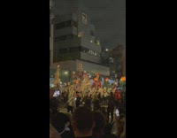 People watch halloween parade at night in NY 