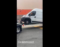 Collab WINY - Tow truck carry white van parking lot