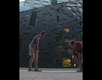 Guy attempts soccer ball trick kicks friend 