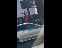 Woman pink outfit pose car roof photo shoot Part 2
