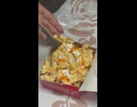 Waffle fries nuggets mac and cheese mixed with sauces 