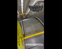 Woman walk up climb on descending escalator 