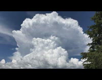 Time lapse cumulonimbus clouds gets larger sky