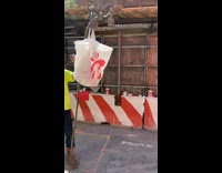 Chick fil a bag lifted by construction 