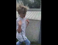 Boy run around trampoline hair gets up