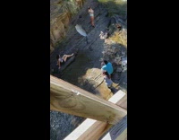 Girl sit photo shoot flash umbrella creek