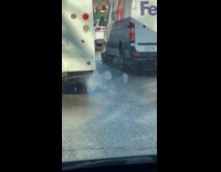 Smoke rings come out from truck exhaust