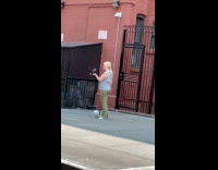 Collab WINY - Blonde woman gray top bounce pet bird on hand